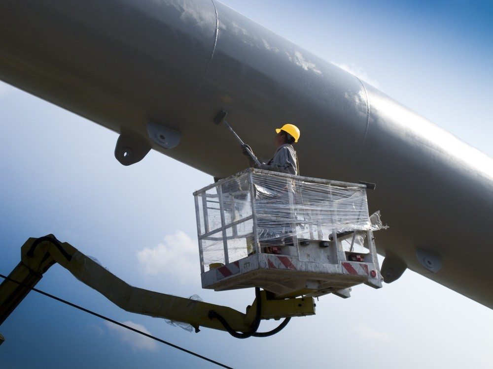 Verven buiten hoogwerker