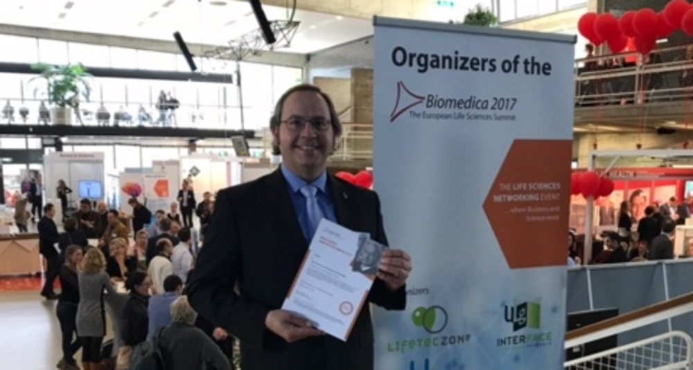 Prijsuitreiking Richard Ramakers, Managing Director AMIBM